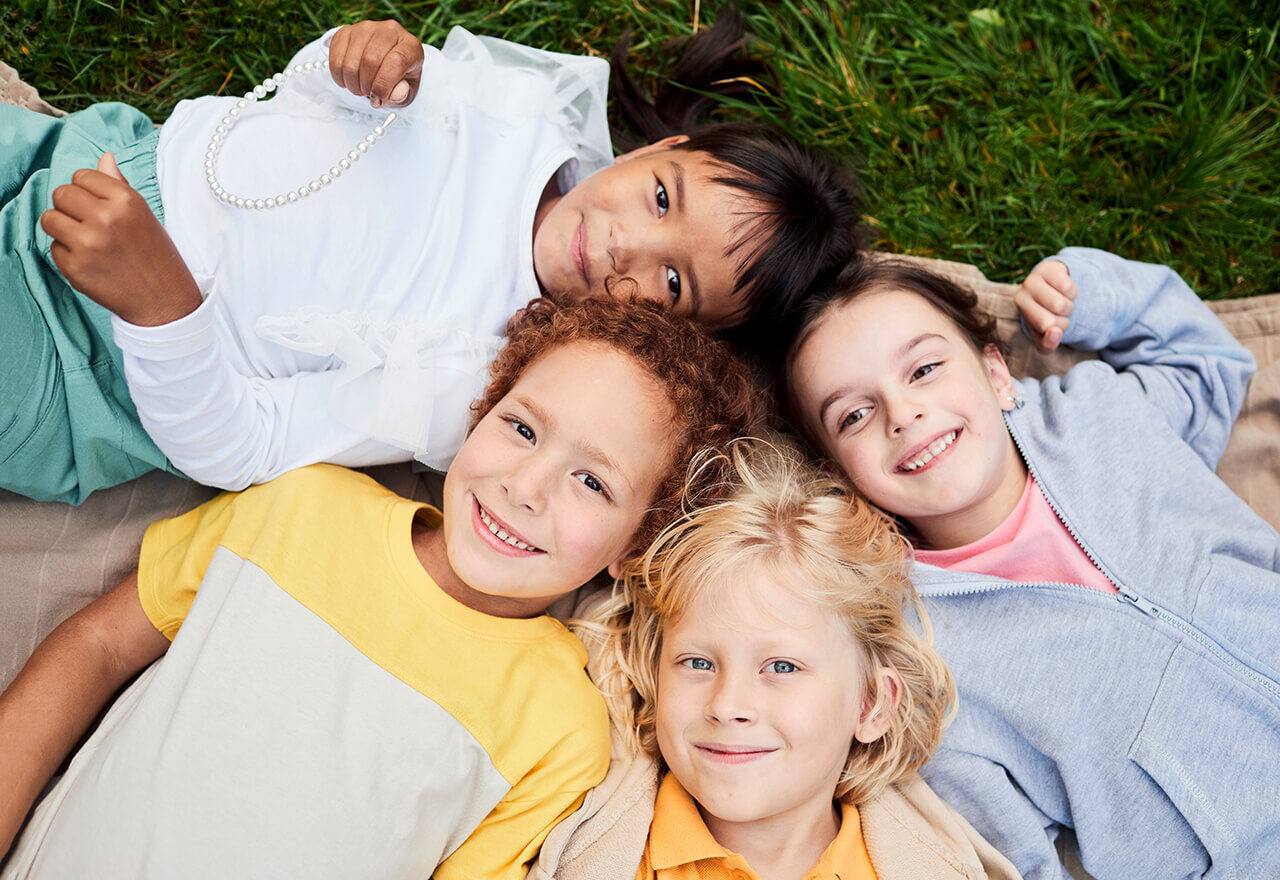 Kids Laying Lawn Diverse Web