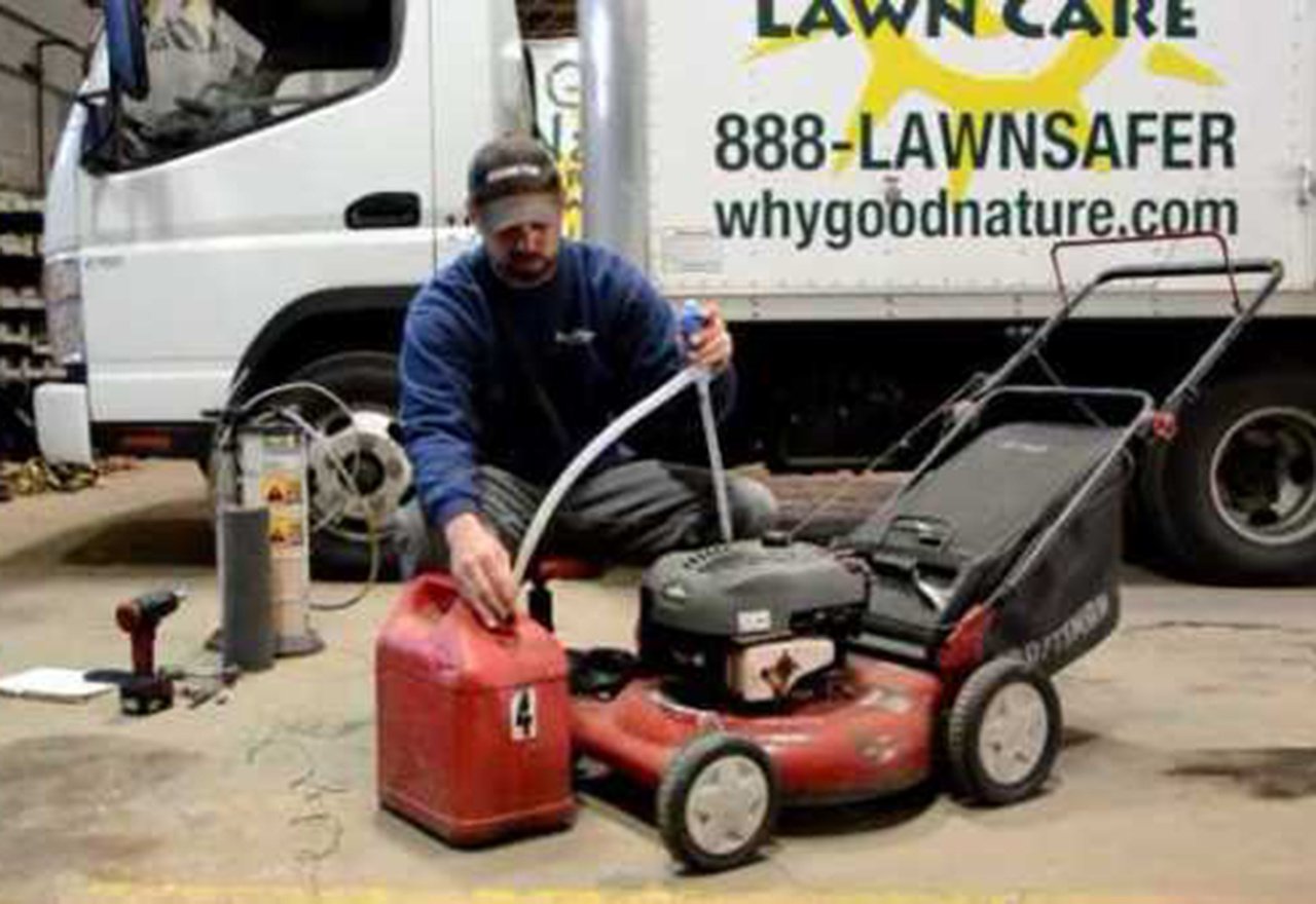 Technician Mike Mechanic Mower Drain Gas