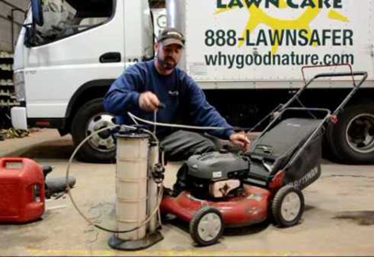 Technician Mike Mechanic Mower Drain Oil